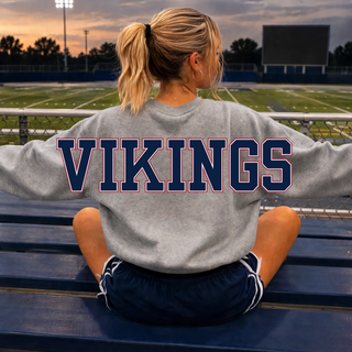 Oversized Seaman Vikings S Logo Sport Grey Crewneck back view with VIKINGS lettering on bleachers