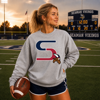 Oversized Seaman Vikings S Logo Sport Grey Crewneck front with S logo and Viking head, model on Seaman field