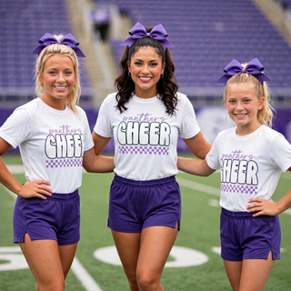 Three cheerleaders wearing white Panthers Cheer bubble t shirts with lavender cursive Panthers and purple checkered stripe on football field with purple bows