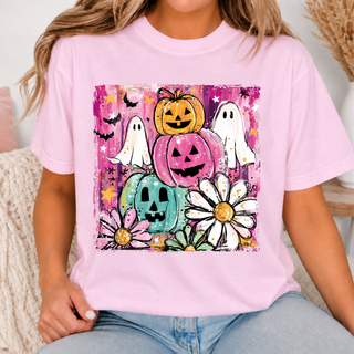 Pastel pumpkins ghosts and daisies graphic tee on pink shirt