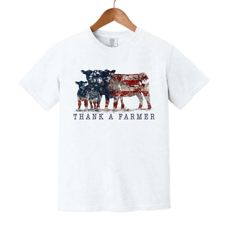 Patriotic cattle farmer white Comfort Colors t-shirt with American flag cow design - Seven Feathers Boutique