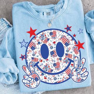 Comfort Colors chambray crewneck sweatshirt folded flat with red white and blue floral American flag smiley face peace sign graphic