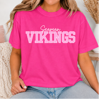 Model wearing hot pink Polka Dot Custom Mascot top with script school name and polka dot block mascot lettering