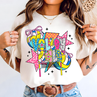 Pop Star Volleyball Graphic Top ivory tee with neon pop art Volleyball lettering, bows, stars, and leopard print design
