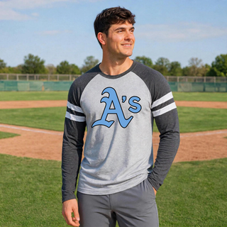 Model wearing Vintage Heather and Vintage Smoke Prime Athletics Baseball A's Logo Mash Up long sleeve top with a large centered A's mark on the chest