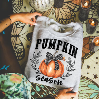 Sport grey crewneck with distressed pumpkin season varsity lettering orange pumpkin polka dot bow and floral wreath design
