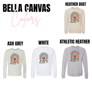 Bella Canvas Rainbow Tiny Humans long sleeves and crewnecks in heather dust, ash grey, white, and athletic heather
