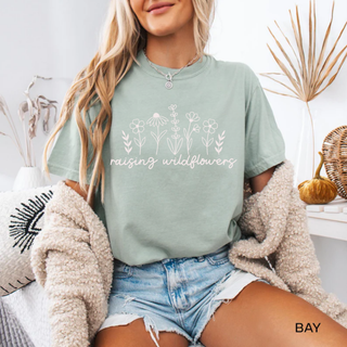 Bay Comfort Colors tee with Raising Wildflowers line art floral graphic in white
