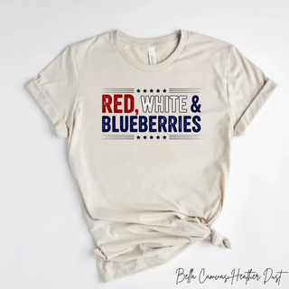 Heather dust Bella Canvas t shirt with red white and blueberries text in red white and blue with stars flat lay