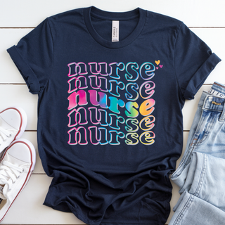 Navy tee laid flat with nurse stacked five times in colorful retro groovy bubble font with heart accents
