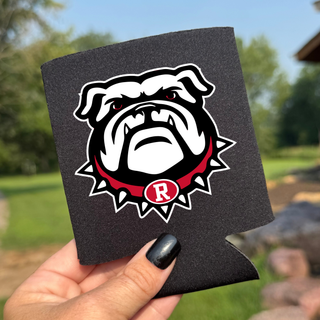 Black neoprene can koozie with Rossville Bulldawgs bulldog mascot and red R collar held outdoors against green background
