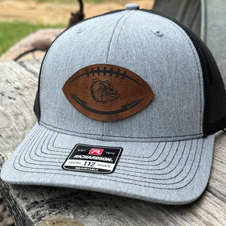 Closeup of Rossville Dawgs bulldog football-shaped leather hat patch