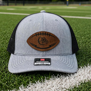 Rossville Dawgs football leather patch Richardson 112 hat on a football field