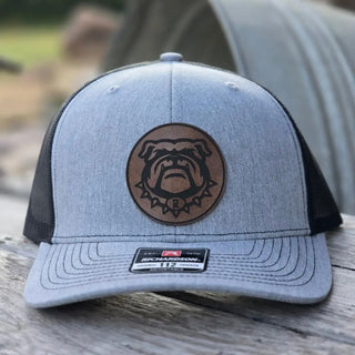 Closeup of Rossville Dawgs bulldog leather circle patch Richardson 112 hat