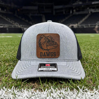 Rossville Dawgs leather patch Richardson 112 trucker hat on a football field