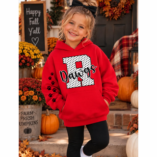 Child modeling a red hoodie with a white polka-dot B, script Dawgs lettering, and black paw prints down the sleeve.