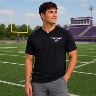 Royal Valley Jr. Panthers football shield short sleeve half-zip jacket worn at a football field