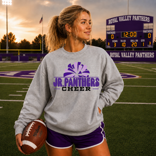 Model wearing a sport grey Royal Valley Jr. Panthers cheer crewneck at the Royal Valley football field