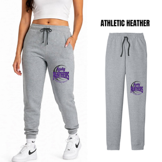 Woman wearing athletic heather grey fleece joggers with a Lady Panthers Basketball design on the front of the leg, with a flat lay of the joggers