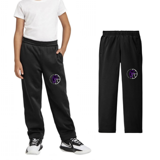 Youth model in black warm-up pants with the Half Court Prowl design on the upper leg, shown with a flat lay
