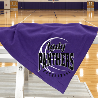 Purple stadium blanket draped over a bleacher rail with a Lady Panthers Basketball design in black and white