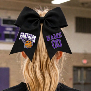 Black cheer bow on a ponytail with a Panthers basketball hoop design and a purple name and number on the tails