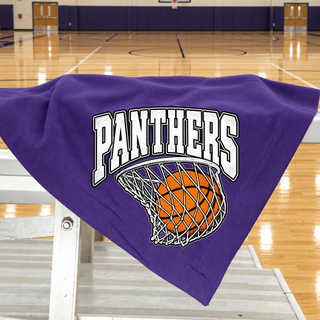 Purple stadium blanket draped over gym bleachers with the Royal Valley Panthers Basketball Hoop design: Panthers in white arched block lettering over an orange basketball in a white net