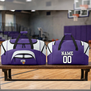 Two purple and white duffel bags on a bench in a gym, one with a Panthers basketball logo on the front pocket and one with a white name and number