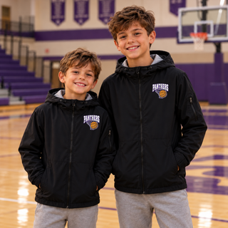 Two boys wearing black waterproof insulated jackets with the Panthers Basketball Hoop design on the left chest, standing in a gym with purple banners