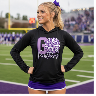 Woman wearing black Go Panthers cheer pom hoodie on football field