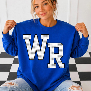 Model wearing the Rural WR top with black petite polka dots