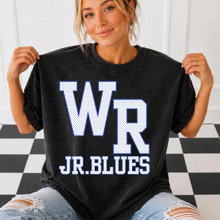 Model wearing the Rural WR varsity top with blue petite polka dots