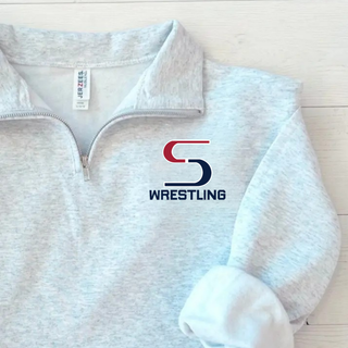 Close-up of an Ash Grey Jerzees cadet quarter-zip with the red and navy S Wrestling logo in navy lettering on the chest