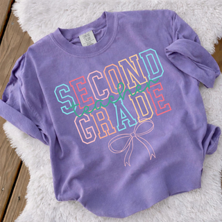 Violet adult Second Grade Teacher Bow Comfort Colors graphic tee with colorful varsity letters