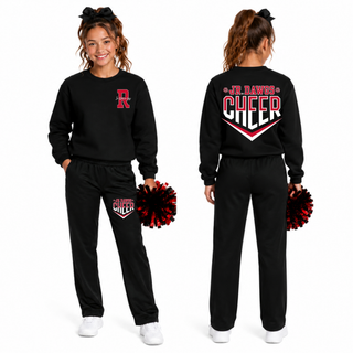 Black top. Front left chest shows red R with Jr. Dawgs script. Back features Jr. Dawgs Cheer Classic Logo chevron in red and white. Model wearing with poms