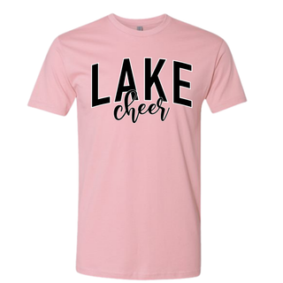 Pink graphic tee with bold LAKE varsity block letters and cheer script lettering
