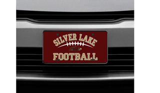 Maroon Silver Lake Eagles Football Classic license plate with gold eagle head and football lace design on car