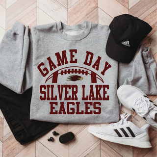 Silver Lake Eagles Football Game Day sweatshirt flatlay with hat and shoes