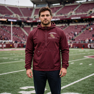 Man wearing Maroon Sport-Tek Packable Anorak with Silver Lake Eagles Football Kickoff SL laces design
