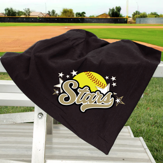 Black stadium blanket draped over white bleachers at a softball field with large gold and white SL Stars softball logo featuring yellow softball gold script Stars and white star burst DTF print with softball field visible in background