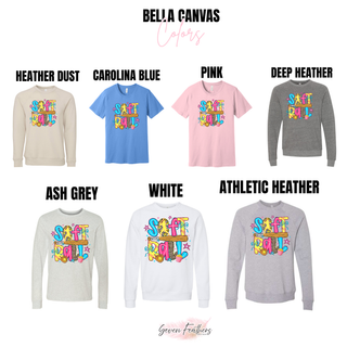 Bella Canvas tee and crewneck color chart showing softball doodle graphic top in heather dust, carolina blue, pink, deep heather, ash grey, white, and athletic heather