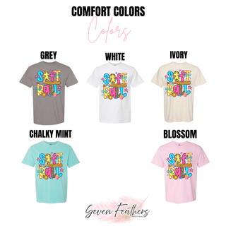 Comfort Colors short sleeve tee color chart showing softball doodle graphic top in grey, white, ivory, chalky mint, and blossom