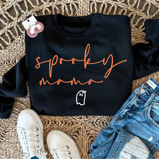 Black crewneck sweatshirt with orange spooky mama script and white ghost design, Halloween graphic top