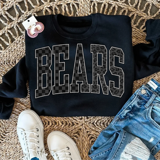 St. Marys Bears Checker Leopard Block Top black crewneck flat lay on woven tray with sneakers and jeans
