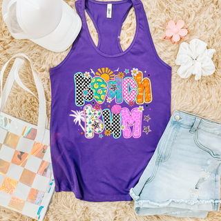 purple Next Level racerback tank with beach bum colorful patterned letters and palm tree, styled with denim shorts and hat
