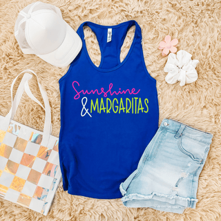 Royal blue racerback tank flat lay with Sunshine and MARGARITAS script design in pink and lime green
