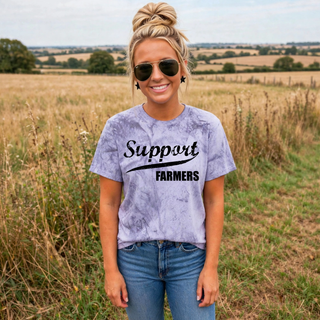 Woman wearing lavender color blast support farmers top in a field, farm life and agriculture apparel