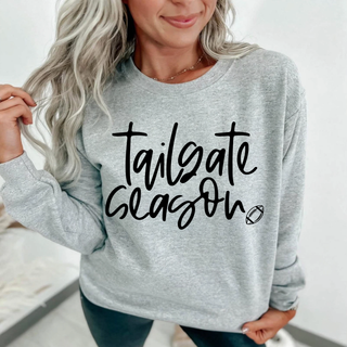 Athletic heather crewneck with black tailgate season script lettering and small football graphic

