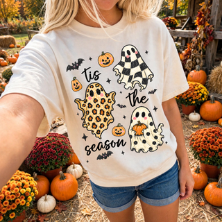 Woman wearing tis the season ghosts top with checkered leopard and polka dot ghosts in ivory at pumpkin patch