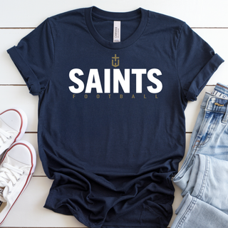 Navy Topeka Saints Bold Emblem Football Top styled with jeans and white shoes